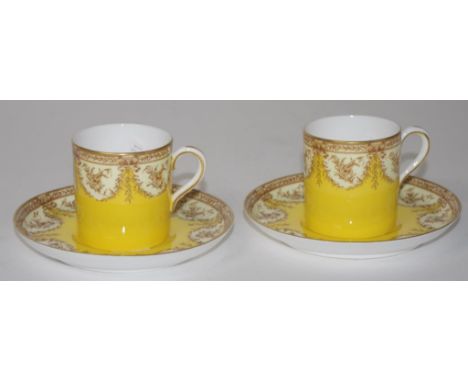Two Royal Worcester demi tasse cups & saucers C1911