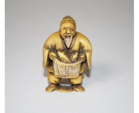 Antique Japanese ivory netsuke fisherman with basket. This item may not be exported without cites documentation. (Height 5cm 