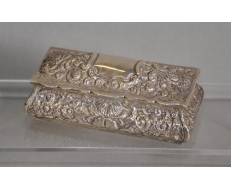 Ornate continental silver trinket box with in relief floral decoration, width 10cm approx, 84 grams approx