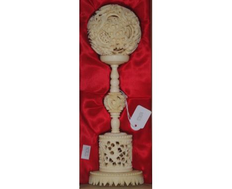 Vintage Chinese carved ivory puzzle ball C1950,decorated with carved dragons to both stand and ball, height 24.5cm approx.  T