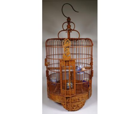 Chinese vintage decorative cane bird cage carved hanging hook and base, with decorative door to cage and roost. Including 4 d