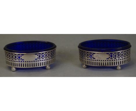 Pair vintage USA sterling silver open salts pierced decoration, each with blue glass liner, and marked to base with # 4705, o