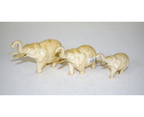 Three graduated antique carved ivory elephants circa 1920, 9cm high (largest),  This item may not be exported without CITES d