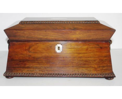 Large Regency rosewood tea caddy sarcophagus shape with double angled top, twin canisters and original bowl with ground ponti