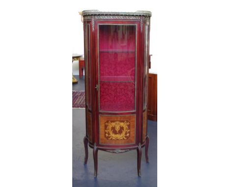 Louis XV style display cabinet with inlay & ormolu, the bow fronted door opening to glass shelves above an enclosed lower sec