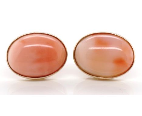 Pink coral and gold stud earrings marked 14k approx 15.8mm x 11.2mm