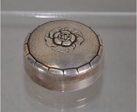 Georg Jenson Denmark sterling silver pill box with embossed flower to centre of the lid, stamped 925