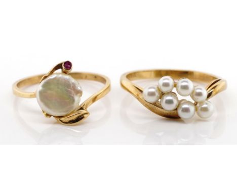 Two 9ct yellow gold and pearl rings both marked 9ct. Approx total weight 3.8 grams, ring size P & N.