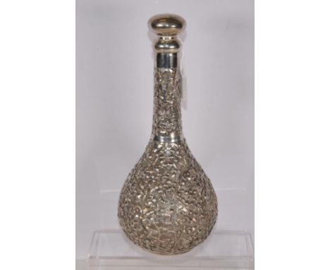 Chinese silver cased cognac decanter hand worked silver cased decanter, with all-over peony and leaf decoration, silver toppe