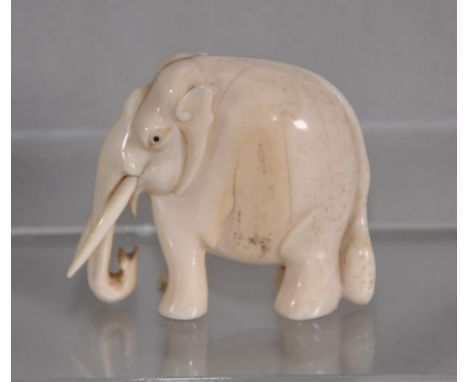 Vintage carved ivory elephant figure Export of this item will be subject to CITES authority. Height 5cm approx.