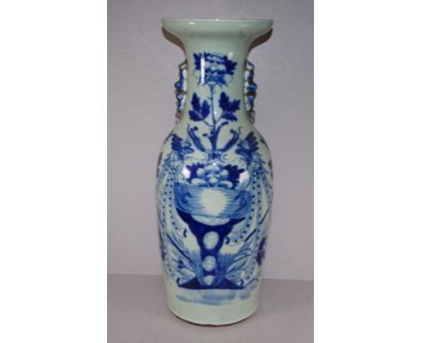 Large antique Chinese Qing period ceramic vase blue and white blossom and foliage decoration, applied handles. Height 58cm ap