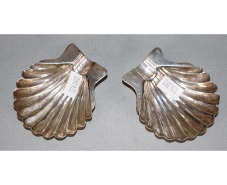 Pair Mexican sterling silver ashtrays each of shell form, marked to bases. (Weight 40grams approx, total).