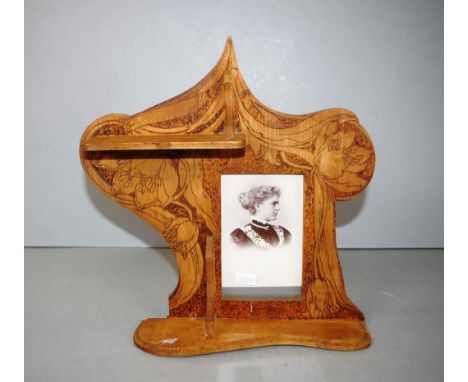 Victorian pokerwork decorated wall shelf pokerwork floral decorated, with Victorian era photograph portrait of a woman, marke
