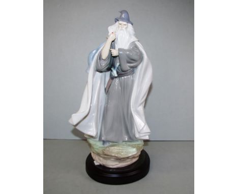 Lladro "The Grey Pilgrim" figurine on a timber stand, from the Lord of the rings collection, edition: 140/500, signed Escup. 