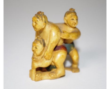 Antique Japanese ivory netsuke group of 3 sumo wrestlers. Signed to base. This item may not be exported without cites documen