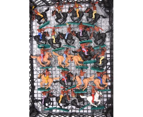 21 Timpo mounted Indians mixed light/ dark brown and also white horses mounted on green plastic bases. Also includes one othe