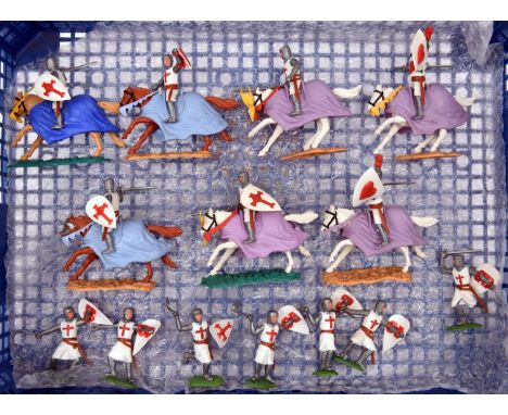 14 Timpo Swoppet knights. 7x mounted with either red cross or red heart on shields, horses mounted on various colour plastic 