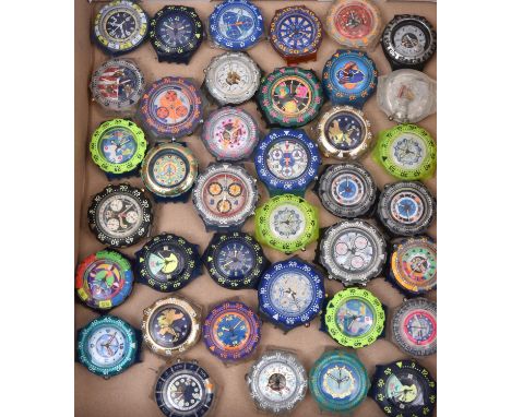38 Swatch watches. A salesman's stock of vintage watches without straps or battery compartment covers. We understand replacem