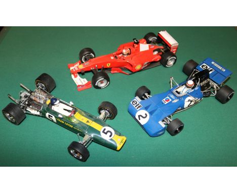 3x 1:18 scale Formula One single seater Racing Cars. Grand Prix Classics Lotus 49 in green &amp; yellow, with driver Jim Clar