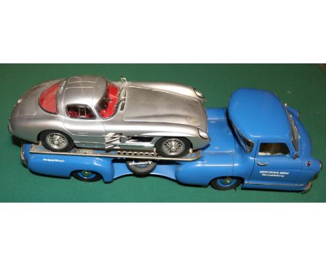 Two fine CMC vehicles. A Mercedes-Benz Renn-Transporter 1954. In blue with silver deck. Together with a Mercedes-Benz 300SLR 