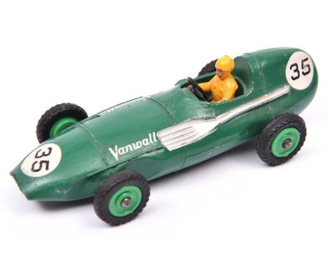 Dinky Toys Vanwall racing car (239).In dark green yellow driver, example with green plastic wheels with black tyres RN35.Unbo