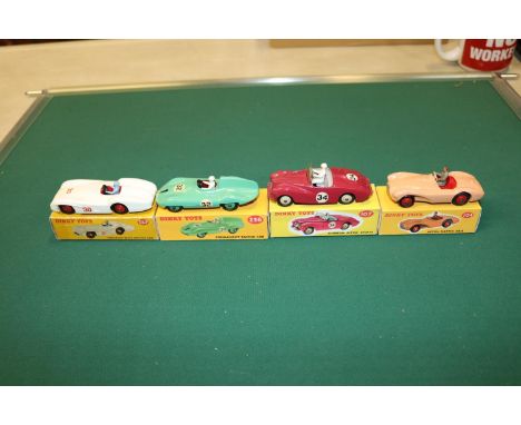 4 Dinky Toys Racing/Sports Cars. Aston Martin DB3S (104). In pink with red interior and wheels. Sunbeam Alpine Sports (107) i