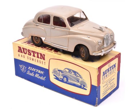 A Victory Industries 1:18 scale battery operated model of an Austin Somerset. Moulded plastic body in fawn, with red interior