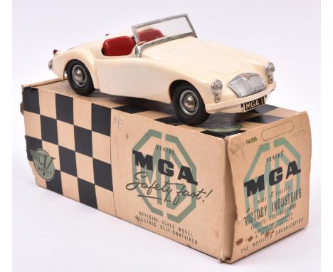 A Victory Industries 1:18 scale battery operated model of an MGA. Moulded plastic body in ivory, with red interior. Boxed, so