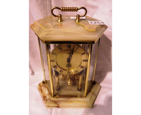 Kondo Onyx and brass quartz anniversary clock. Not available for in-house P&amp;P 
