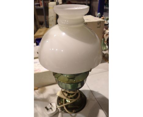 Brass paraffin lamp converted to electric. All electrical items in this lot have been PAT tested for safety and have passed. 