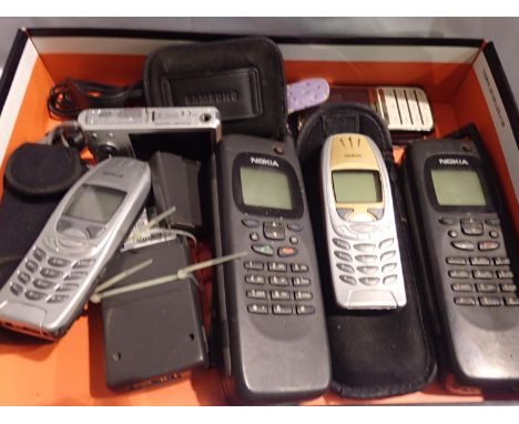 Collection of mixed mobile phones and a Samsung camera. P&amp;P Group 2 (£18+VAT for the first lot and £3+VAT for subsequent 