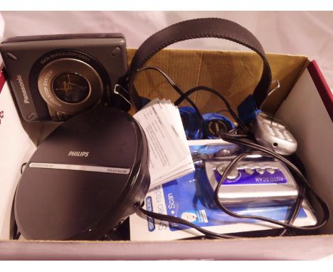 Two Sony Panasonic Walkmans, headphones and a mini radio. P&amp;P Group 2 (£18+VAT for the first lot and £3+VAT for subsequen