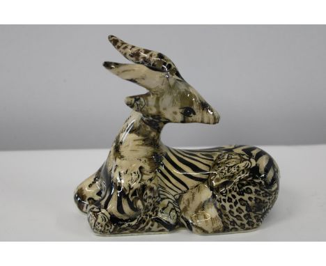 A Collage safari ceramic antelope figurine 