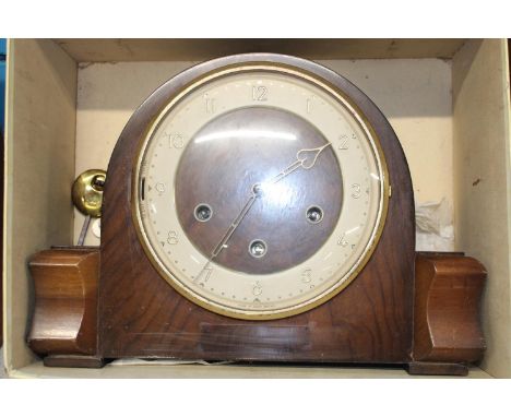 A vintage working mantel clock in original box 