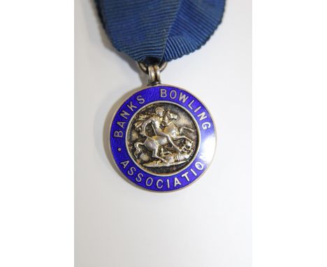 A vintage hallmarked silver &amp; enamel bowling medal 