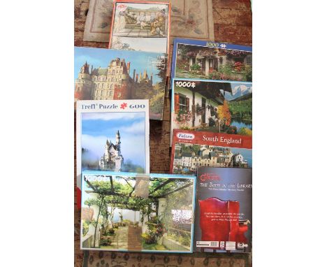 A box full of vintage jig saw puzzles (complete) 