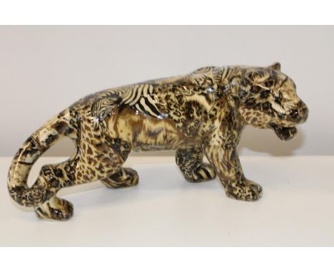 A Collage safari ceramic Tiger figurine 