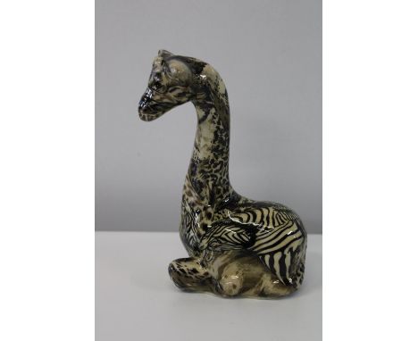 A Collage safari ceramic giraffe figurine 