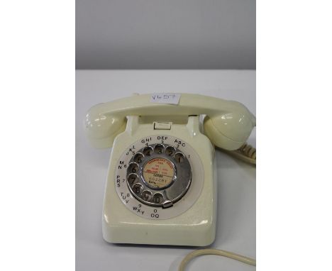 A vintage cream coloured GPO telephone 