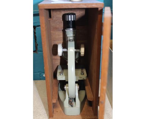 A boxed vintage microscope 