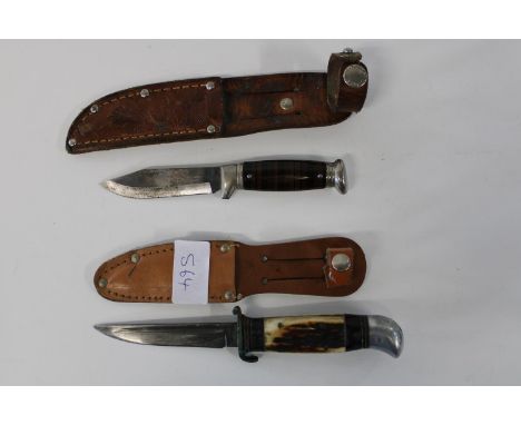 Two vintage hunting knives. Richard's Tent brand &amp; P Holmberg, both with sheaths 