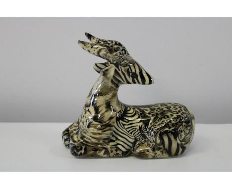 A Collage safari ceramic antelope figurine 