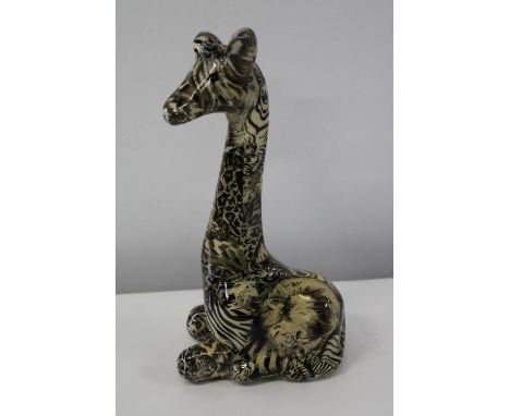 A Collage safari ceramic giraffe figurine 