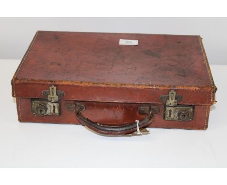 A small vintage leather suitcase 35cm x 23cm 