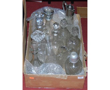 A box of miscellaneous glassware to include a claret jug with cut glass body and silver plated mount, a ships decanter and va