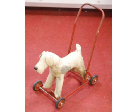 A Chiltern Toys push-along straw filled plush dog (playworn)