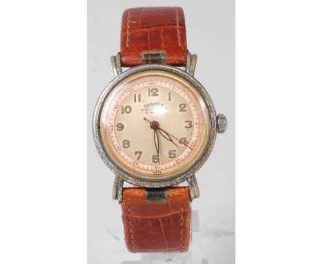A vintage Roamer gent's steel cased wristwatch, having a signed champagne dial with fine outer scale, manual wind movement, b