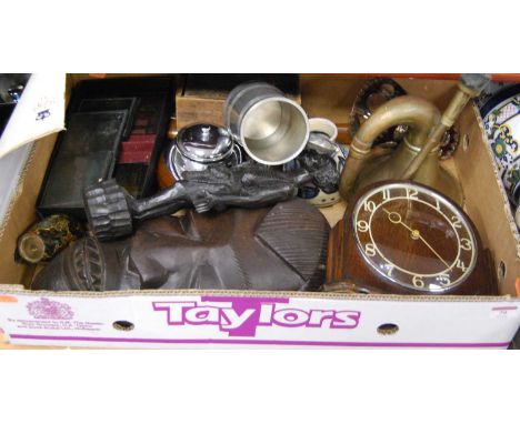 A box containing a collection of items to include a 1930s Smiths and oak cased mantel clock, a ruby overlaid glass vase, a ma