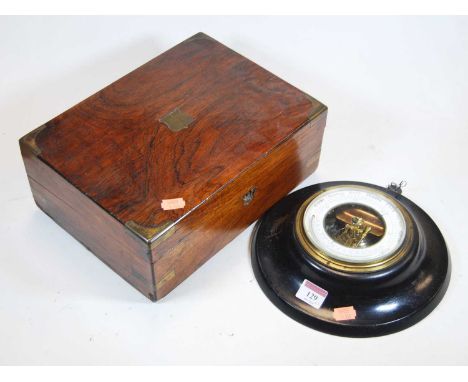 A mid 19th century rosewood box with inset brass cartouche and corners, width 30cm,together with an early 20th century aneroi