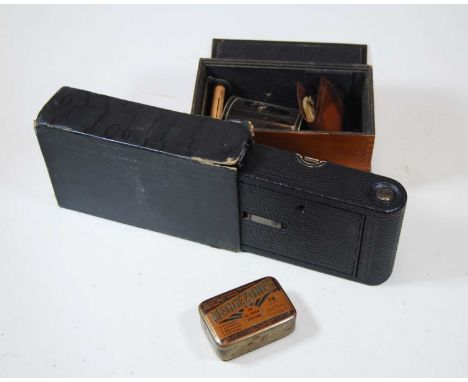 A boxed Kodak camera together with a Kodak tank developer